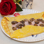 Omelette con jamón, queso y champiñones