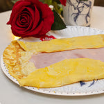 Omelette con jamón y queso