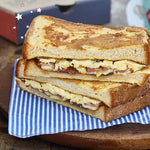 Sandwich de queso, tocino y huevo
